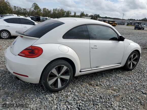 2012 Volkswagen Beetle 2.0T Turbo w/Sun/Sound PZEV with VIN 3VWVA7AT2CM619430, listed as a Copart auction lot 79994774 with 133,927 mi miles and Clean Title. Bid and sale history available at carsss.com. Image 3.