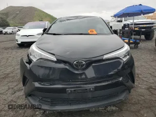 2019 Toyota C-HR XLE z VIN JTNKHMBX8K1055954, wystawiony jako Copart lot #53290965 z przebiegiem 63 265 mil mil oraz Szkoda całkowita • Salvage title. Historia ofert i sprzedaży dostępna na DreamBid. Obrazek 5.