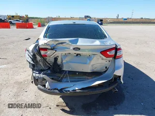 2016 Ford Fusion S z VIN 3FA6P0G75GR105206, wystawiony jako IAAI lot #42032773 z przebiegiem 174 927 mil mil oraz . Historia ofert i sprzedaży dostępna na DreamBid. Obrazek 16.