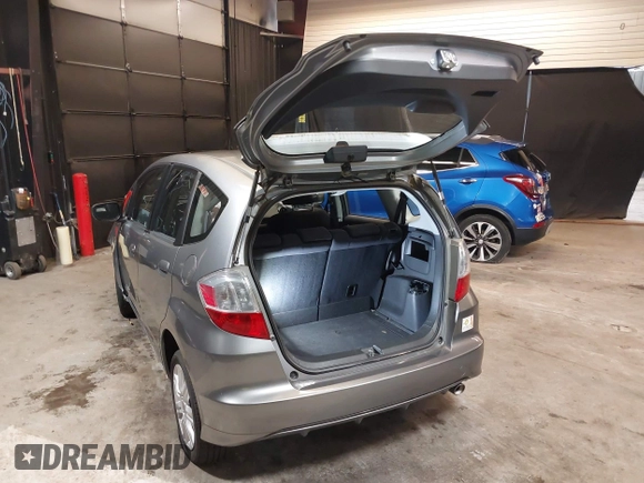 2010 Honda Fit Sport with VIN JHMGE8H43AC036091, listed as a IAAI auction lot 42566790 with 65,506 mi miles and . Bid and sale history available at DreamBid. Image 3.