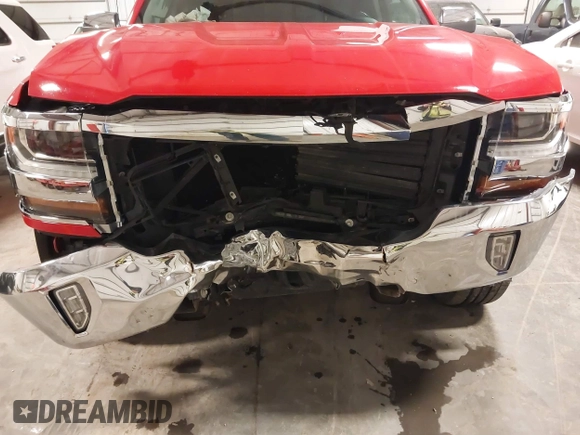 2017 Chevrolet Silverado 1500 LT with VIN 3GCUKREC9HG458520, listed as a IAAI auction lot 41364459 with 130,130 mi miles and . Bid and sale history available at DreamBid. Image 6.