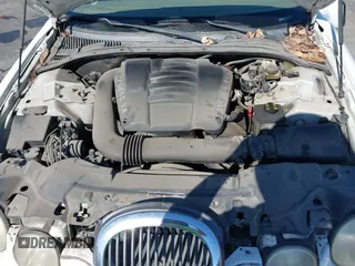 2000 Jaguar S-Type V8 with VIN SAJDA01D9YGL52238, listed as a IAAI auction lot 38743231 with Not Provided miles and . Bid and sale history available at DreamBid. Image 10.