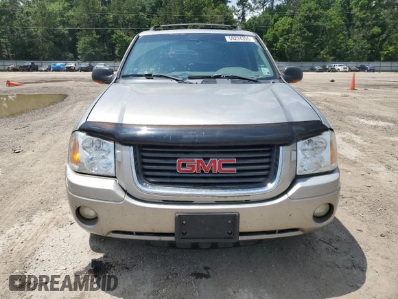 2002 GMC Envoy SLT z VIN 1GKDS13S922263923, wystawiony jako Copart lot #59234395 z przebiegiem Nie podano mil oraz Szkoda całkowita • Salvage title. Historia ofert i sprzedaży dostępna na DreamBid. Obrazek 5.