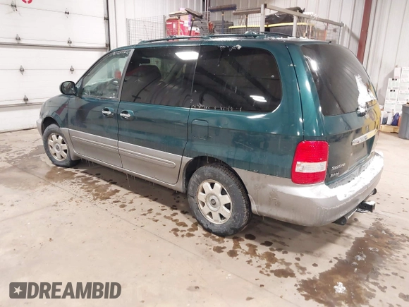2003 Kia Sedona LX with VIN KNDUP131336390410, listed as a IAAI auction lot 41602426 with 170,613 mi miles. Bid and sale history available at carsss.com. Image 3.