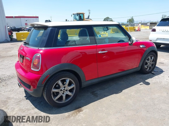 2009 MINI Hardtop S with VIN WMWMF73529TW84638, listed as a IAAI auction lot 42565544 with 60,721 mi miles and . Bid and sale history available at DreamBid. Image 4.