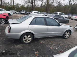 2002 Mazda Protege DX with VIN JM1BJ225920515625, listed as a IAAI auction lot 41144290 with 230,434 mi miles. Bid and sale history available at carsss.com. Image 13.