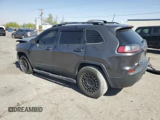 2021 Jeep Cherokee 80th Anniversary with VIN 1C4PJMMX2MD106233, listed as a Copart auction lot 52980415 with 77,979 mi miles and Salvage title. Bid and sale history available at DreamBid. Image 2.