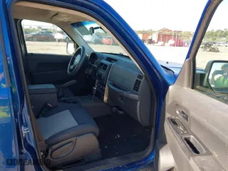 2010 Jeep Liberty Sport with VIN 1J4PN2GK1AW101737, listed as a IAAI auction lot 42003425 with 128,654 mi miles. Bid and sale history available at carsss.com. Image 5.