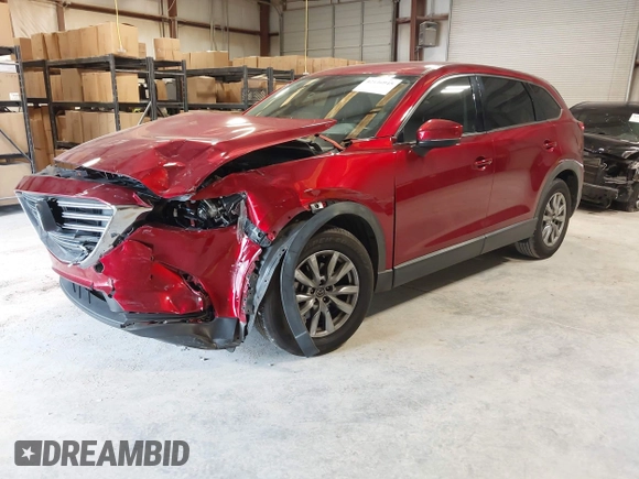 2019 Mazda CX-9 Touring with VIN JM3TCACY1K0331904, listed as a IAAI auction lot 42146945 with 77,699 mi miles and . Bid and sale history available at DreamBid. Image 2.