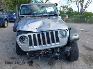 2018 Jeep Wrangler Unlimited Sport S с VIN 1C4HJXDG7JW170077, выставлен на аукционе IAAI как лот 42019911 с пробегом Не указан миль и . История ставок и продаж доступна на DreamBid. Изображение 13.