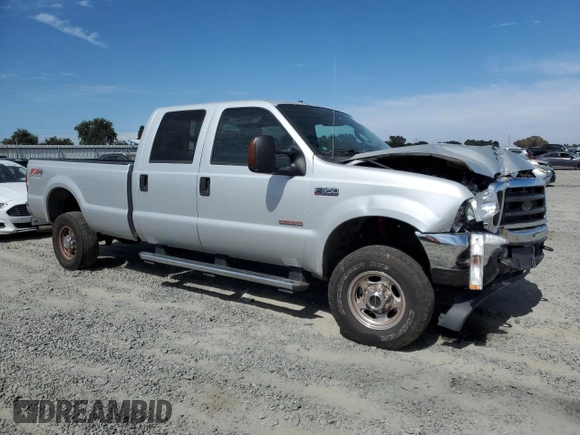 2004 Ford F-350 XL with VIN 1FTSW31P04EC44129, listed as a Copart auction lot 63519165 with 205,411 mi miles and Salvage title. Bid and sale history available at DreamBid. Image 4.