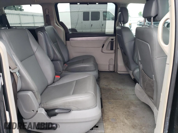 2014 Volkswagen Routan SE z VIN 2C4RVABG1ER134621, wystawiony jako Copart lot #61339414 z przebiegiem 153 364 mil mil oraz Szkoda całkowita • Salvage title. Historia ofert i sprzedaży dostępna na DreamBid. Obrazek 12.