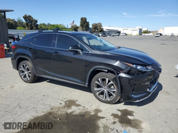 2021 Lexus RX 350 with VIN 2T2HZMDAXMC285929, listed as a Copart auction lot 58866925 with 19,464 mi miles and Salvage title. Bid and sale history available at DreamBid. Image 4.