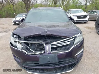 2015 Lincoln MKC with VIN 5LMTJ2AH5FUJ20686, listed as a IAAI auction lot 42037069 with 134,122 mi miles. Bid and sale history available at carsss.com. Image 6.