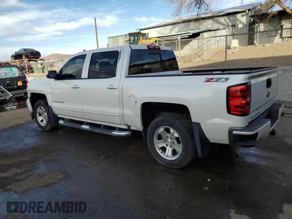 2016 Chevrolet Silverado 1500 LT with VIN 3GCUKREC3GG357911, listed as a Copart auction lot 43985735 with 145,647 mi miles and Salvage Title. Bid and sale history available at DreamBid. Image 2.