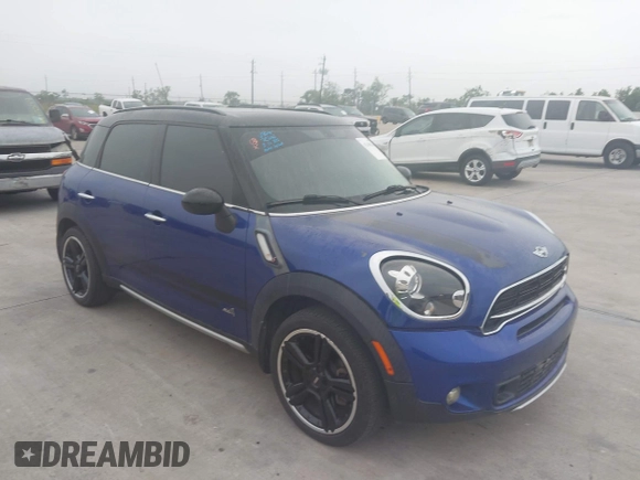 2015 MINI Cooper Countryman S with VIN WMWZC5C50FWP47426, listed as a IAAI auction lot 42108546 with 103,281 mi miles. Bid and sale history available at carsss.com. Image 1.