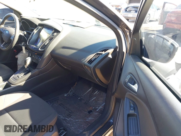 2016 Ford Focus SE with VIN 1FADP3F21GL262907, listed as a IAAI auction lot 41657582 with 62,789 mi miles. Bid and sale history available at carsss.com. Image 5.