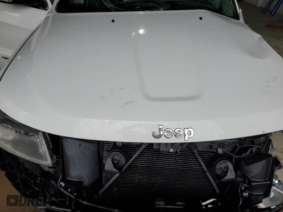 2014 Jeep Grand Cherokee Limited with VIN 1C4RJFBG0EC111736, listed as a Copart auction lot 51604645 with Not provided miles and Salvage title. Bid and sale history available at DreamBid. Image 13.
