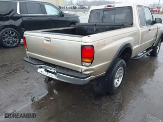2000 Mazda B-Series 4WD Truck SE with VIN 4F4ZR17V4YTM04182, listed as a IAAI auction lot 41643775 with 181,854 mi miles. Bid and sale history available at carsss.com. Image 4.