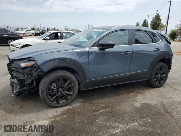 2023 Mazda CX-30 S Carbon Edition with VIN 3MVDMBCM5PM560912, listed as a Copart auction lot 59174445 with 5,247 mi miles and Salvage title. Bid and sale history available at DreamBid. Image 1.