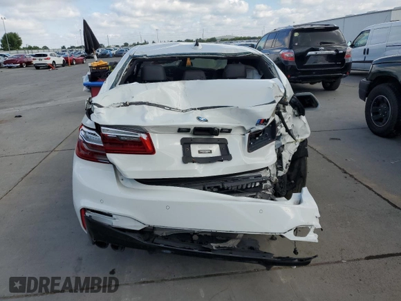 2019 BMW M5 z VIN WBSJF0C50KB448040, wystawiony jako Copart lot #54800055 z przebiegiem Nie podano mil oraz Czysty tytuł • Clean title. Historia ofert i sprzedaży dostępna na DreamBid. Obrazek 6.