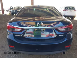 2016 Mazda 6 i Touring with VIN JM1GJ1T5XG1434388, listed as a IAAI auction lot 41528124 with 99,293 mi miles and . Bid and sale history available at DreamBid. Image 16.