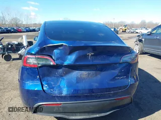 2021 Tesla Model Y Long Range with VIN 5YJYGDEE8MF293230, listed as a IAAI auction lot 41744033 with 56,797 mi miles and . Bid and sale history available at DreamBid. Image 6.
