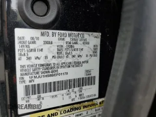 2011 Ford Expedition XLT z VIN 1FMJU1H58BEF01170, wystawiony jako Copart lot #55180025 z przebiegiem 99 677 mil mil oraz Szkoda całkowita • Salvage title. Historia ofert i sprzedaży dostępna na DreamBid. Obrazek 13.