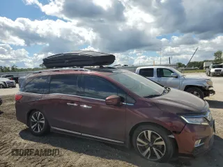 2018 Honda Odyssey Touring with VIN 5FNRL6H8XJB500004, listed as a Copart auction lot 70344524 with 91,226 mi miles and Salvage Title. Bid and sale history available at carsss.com. Image 4.