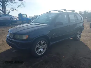 2003 BMW X5 4.4i with VIN 5UXFB33543LH43200, listed as a IAAI auction lot 41652303 with 169,250 mi miles. Bid and sale history available at carsss.com. Image 2.