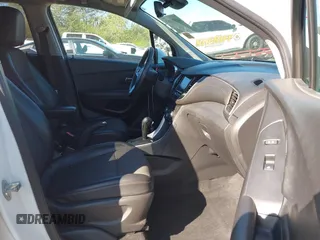 2020 Chevrolet Trax LT with VIN KL7CJLSB9LB005813, listed as a IAAI auction lot 41802888 with 31,212 mi miles and . Bid and sale history available at DreamBid. Image 5.