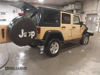 2014 Jeep Wrangler Unlimited Sport with VIN 1C4BJWDG2EL134143, listed as a IAAI auction lot 41957046 with 151,529 mi miles and . Bid and sale history available at DreamBid. Image 4.