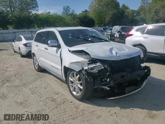 2015 Jeep Grand Cherokee Summit with VIN 1C4RJFJG3FC847797, listed as a Copart auction lot 54848085 with 53,506 mi miles and Salvage Title. Bid and sale history available at DreamBid. Image 14.