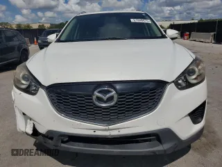 2015 Mazda CX-5 Sport z VIN JM3KE2BE6F0546994, wystawiony jako Copart lot #61948075 z przebiegiem 111 845 mil mil oraz Czysty tytuł • Clean title. Historia ofert i sprzedaży dostępna na DreamBid. Obrazek 5.