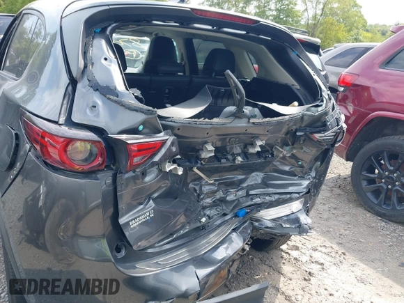2020 Mazda CX-5 Grand Touring with VIN JM3KFBDM1L0821975, listed as a IAAI auction lot 40088794 with 68,895 mi miles and . Bid and sale history available at DreamBid. Image 12.