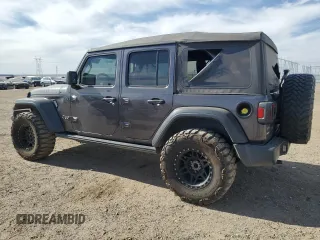 2020 Jeep Wrangler Unlimited Willys with VIN 1C4HJXDG5LW246978, listed as a Copart auction lot 52930515 with 117,020 mi miles and Salvage title. Bid and sale history available at DreamBid. Image 2.