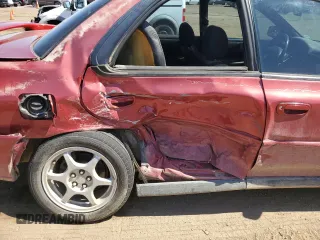 2000 Subaru Impreza RS with VIN JF1GC6751YH501153, listed as a Copart auction lot 58530374 with 91,817 mi miles and Salvage title. Bid and sale history available at DreamBid. Image 11.