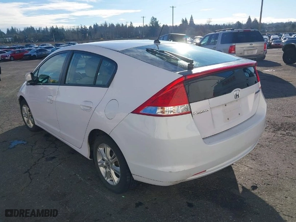 2010 Honda Insight EX with VIN JHMZE2H7XAS015986, listed as a IAAI auction lot 41229343 with 137,276 mi miles. Bid and sale history available at carsss.com. Image 3.