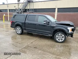 2018 Ford F-150 XL with VIN 1FTEW1EG0JFD10941, listed as a Copart auction lot 57855095 with 119,345 mi miles and Salvage title. Bid and sale history available at DreamBid. Image 13.