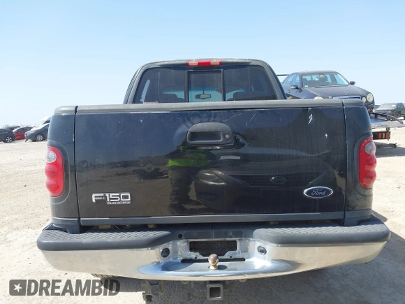 2003 Ford F-150 XLT with VIN 1FTRW07L53KC01651, listed as a IAAI auction lot 41827007 with 233,842 mi miles and . Bid and sale history available at DreamBid. Image 16.