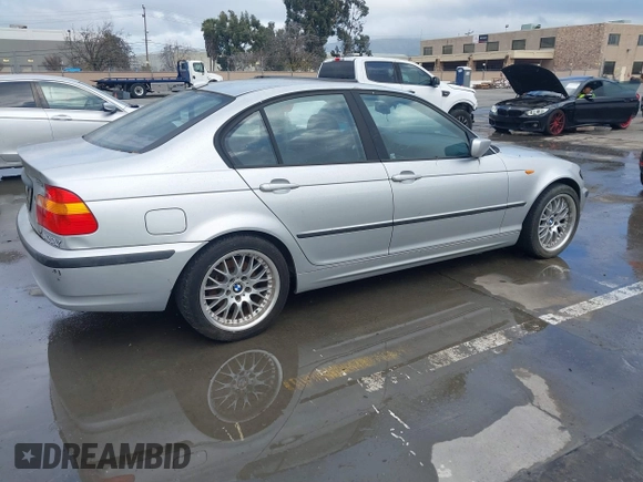 2005 BMW 3 Series 325i with VIN WBAAZ33485KP91350, listed as a IAAI auction lot 41536220 with 153,894 mi miles and . Bid and sale history available at DreamBid. Image 4.
