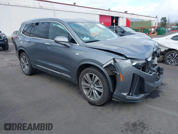 2021 Cadillac XT6 Premium Luxury with VIN 1GYKPDRS2MZ228111, listed as a IAAI auction lot 41671112 with 45,980 mi miles. Bid and sale history available at carsss.com. Image 1.