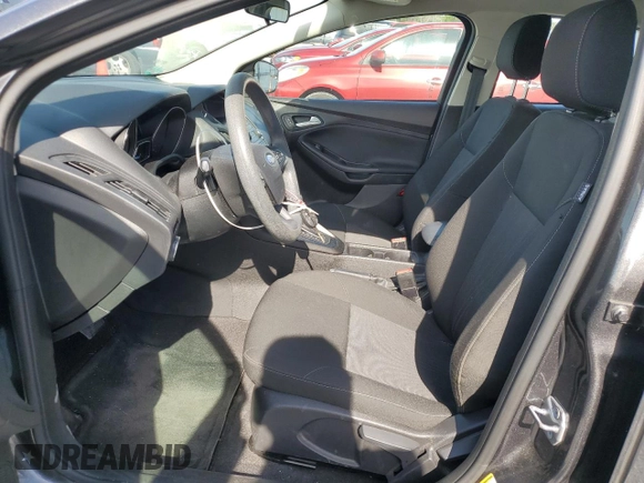 2018 Ford Focus SE with VIN 1FADP3F22JL304959, listed as a Copart auction lot 51994825 with 54,858 mi miles and Salvage Title. Bid and sale history available at DreamBid. Image 7.