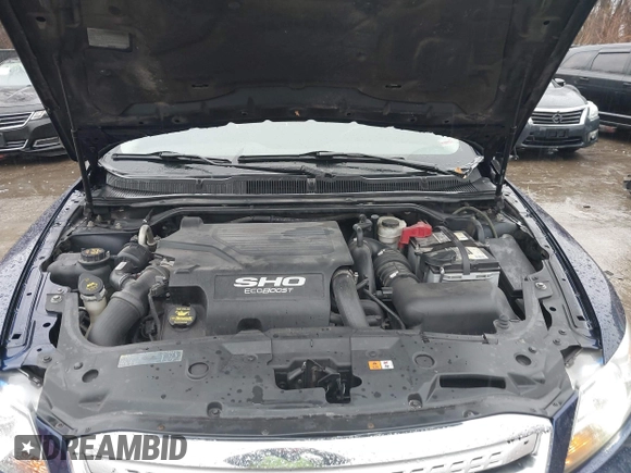 2011 Ford Taurus SHO with VIN 1FAHP2KT5BG140644, listed as a IAAI auction lot 41686481 with 351,294 mi miles and . Bid and sale history available at DreamBid. Image 10.