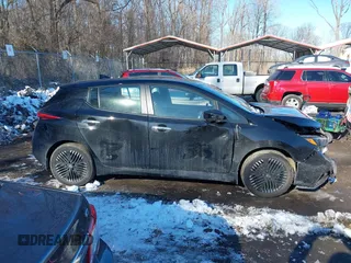 2024 Nissan LEAF SV Plus z VIN 1N4CZ1CV1RC553743, wystawiony jako IAAI lot #41286217 z przebiegiem 10 707 mil mil oraz . Historia ofert i sprzedaży dostępna na DreamBid. Obrazek 13.