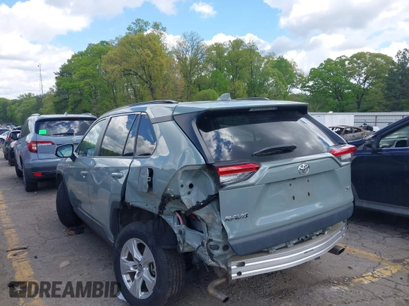2019 Toyota RAV4 XLE with VIN 2T3W1RFV3KW056351, listed as a IAAI auction lot 42011662 with 64,634 mi miles. Bid and sale history available at carsss.com. Image 3.