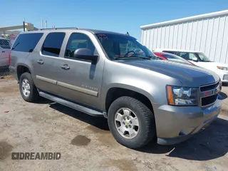 2007 Chevrolet Suburban LTZ z VIN 3GNFK16327G276916, wystawiony jako IAAI lot #42131582 z przebiegiem 182 325 mil mil oraz . Historia ofert i sprzedaży dostępna na DreamBid. Obrazek 1.