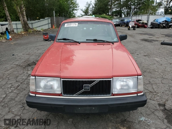 1993 Volvo 240 with VIN YV1AW8801P1942014, listed as a Copart auction lot 69491174 with 145,809 mi miles and Salvage title. Bid and sale history available at DreamBid. Image 5.