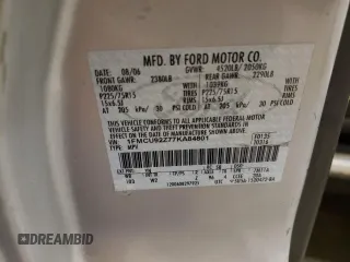 2007 Ford Escape XLS with VIN 1FMCU92Z77KA84801, listed as a Copart auction lot 82052144 with 180,774 mi miles and Salvage title. Bid and sale history available at DreamBid. Image 13.