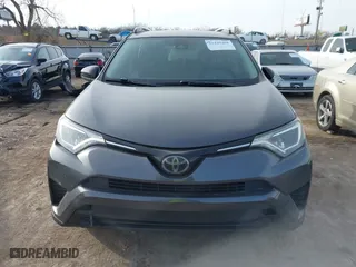 2018 Toyota RAV4 LE with VIN JTMZFREV4JJ183106, listed as a IAAI auction lot 41449468 with 114,719 mi miles. Bid and sale history available at carsss.com. Image 12.
